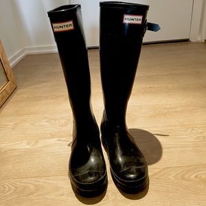 Black tall hunter rain boots